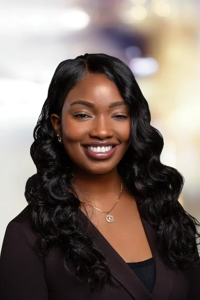 Portrait of Aicha Millien, REALTOR®.